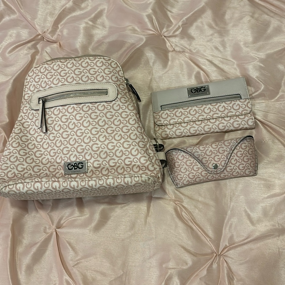 Set of three trifold wallet,backpack, and sunglasses case